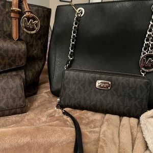 Black Michael Kors bag and matching wallet